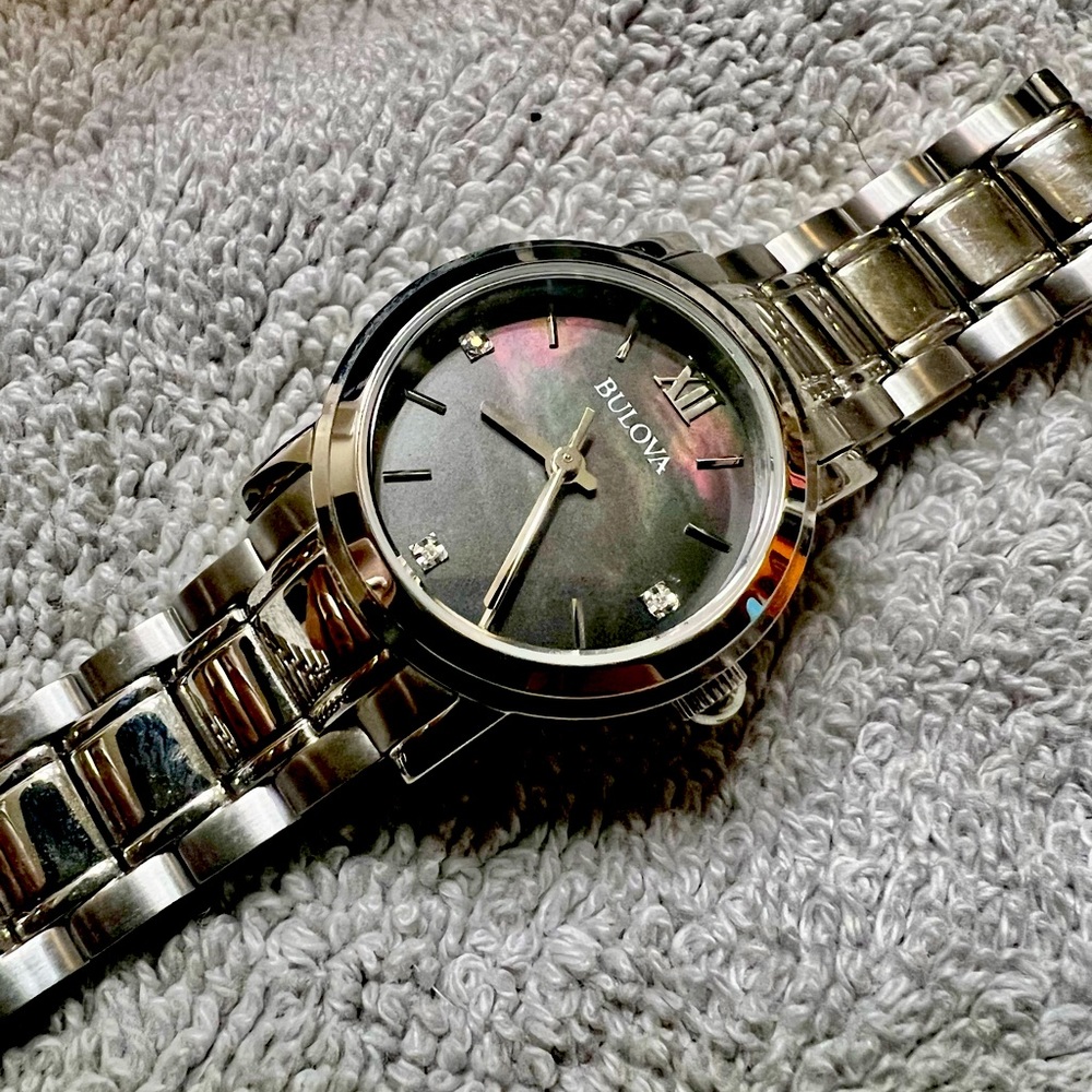 Womens Bulova Silver w/ Black mother of pearl face w/ Diamond accents